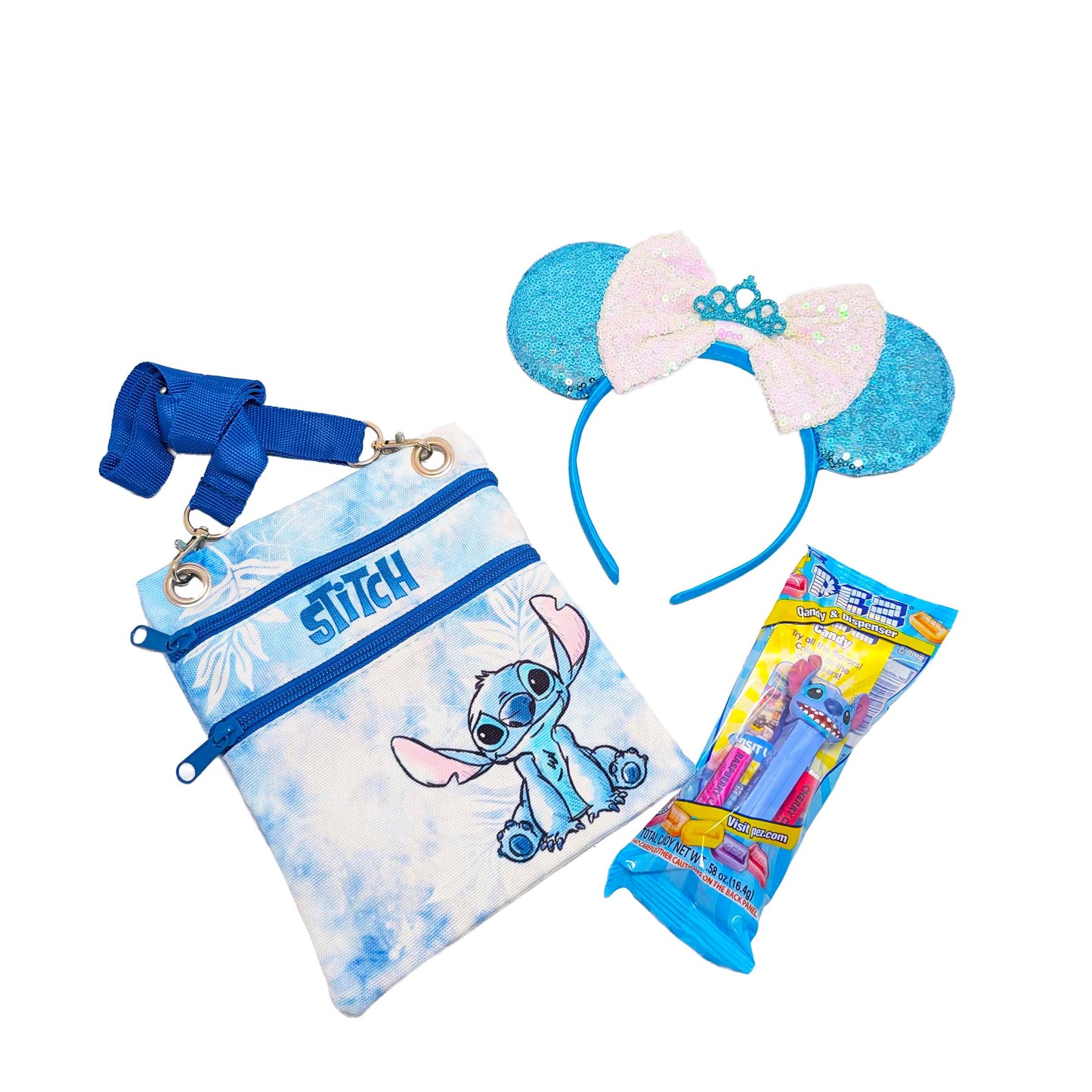 Disney Stitch gift set featuring a blue tie-dye passport crossbody bag, matching blue sequined Minnie ears with a tiara, and a Stitch PEZ dispenser for custom Orlando resort gift baskets
