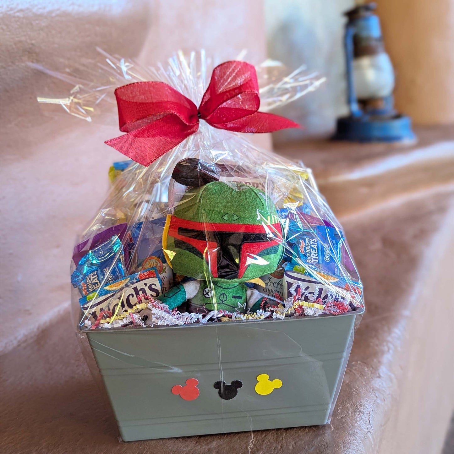 Custom Star Wars Boba Fett gift basket filled with a licensed plush toy, assorted snacks, and treats for Orlando resort delivery
