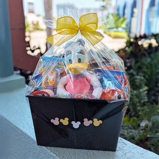 Disney Daisy Duck plush gift basket with snacks and treats, perfect for Walt Disney World resort deliveries in Orlando