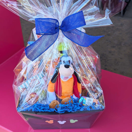 Custom Disney Goofy gift basket filled with a licensed plush toy, assorted snacks, and treats for Orlando resort delivery