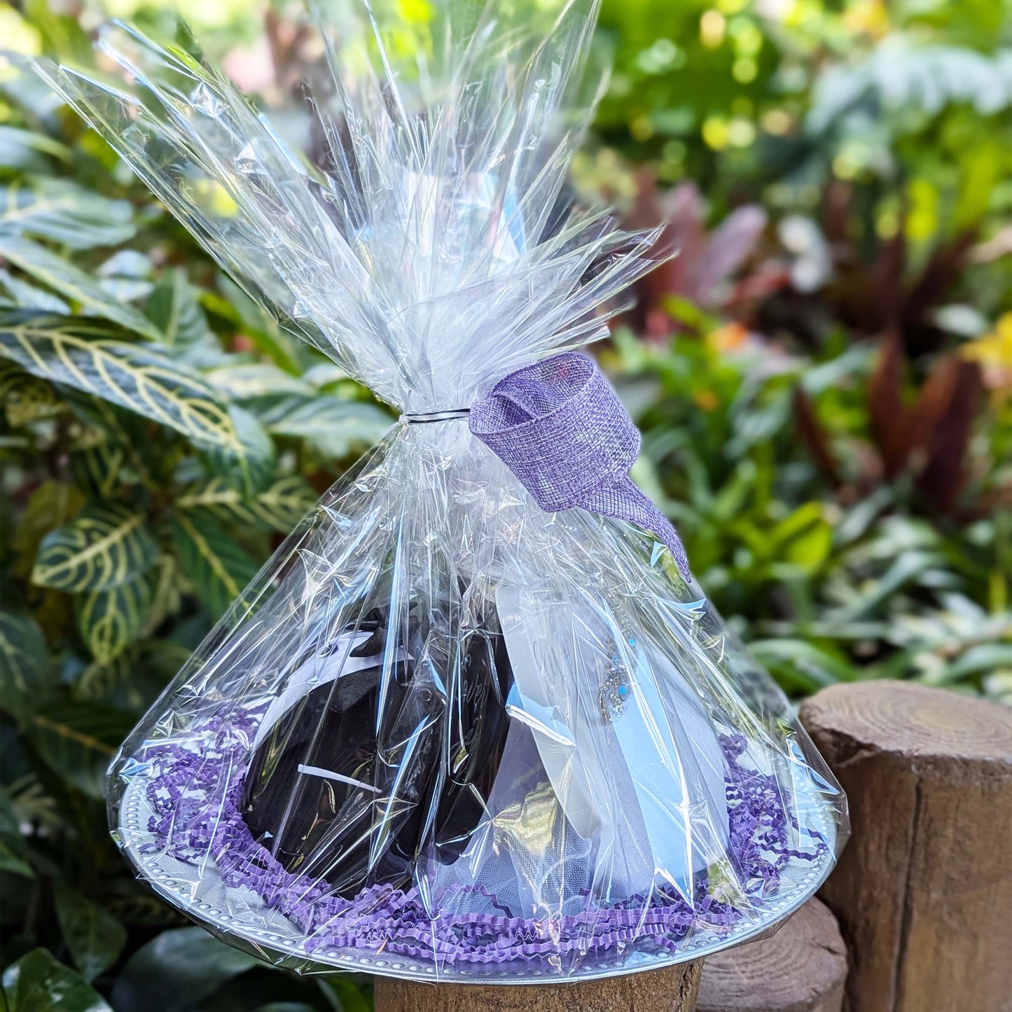 Disney bride and groom ear hats with "Happily Ever After" buttons in a custom gift basket, perfect for Walt Disney World resort deliveries in Orlando