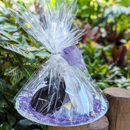 Disney bride and groom ear hats with "Happily Ever After" buttons in a custom gift basket, perfect for Walt Disney World resort deliveries in Orlando