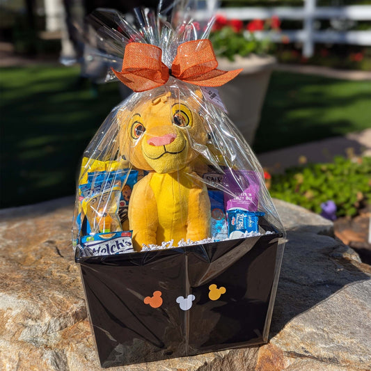 Custom Disney Lion King Simba gift basket filled with a licensed plush toy, assorted snacks, and treats for Orlando resort delivery