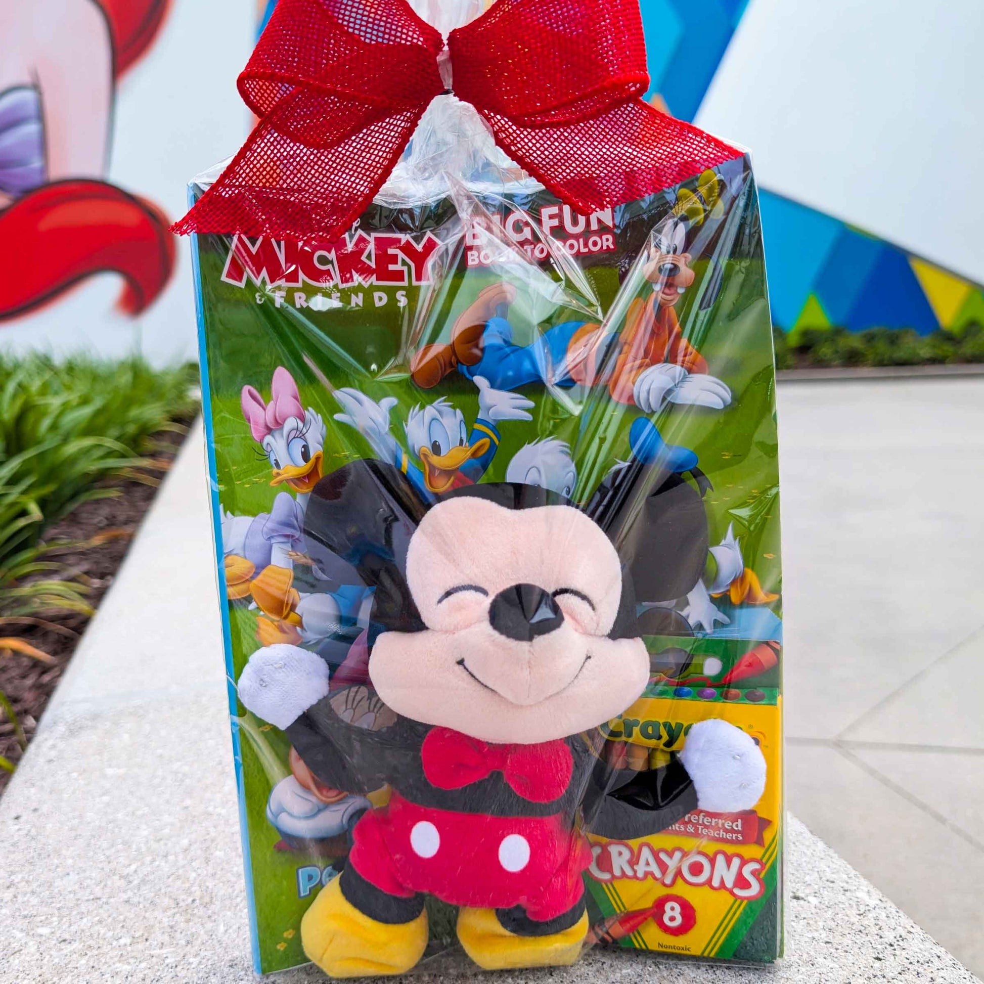 Mickey Mouse plush doll and Mickey and Friends coloring activity kit with crayons for kids vacation gift baskets