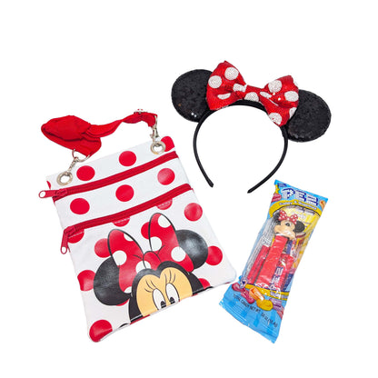 Minnie Mouse gift set featuring a red and black polka dot passport crossbody bag, matching sequined Minnie ears, and a Minnie PEZ dispenser for custom Orlando resort gift baskets