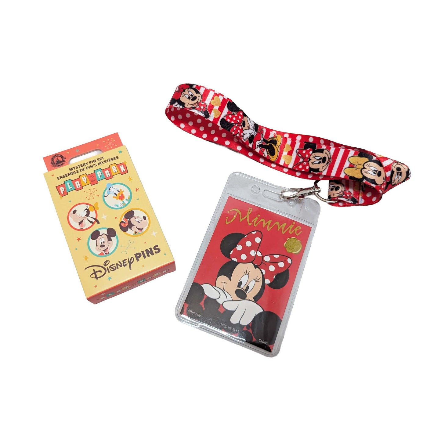 Disney Minnie Mouse-themed lanyard, badge holder, and mystery pin box starter set for pin trading adventures at Walt Disney World area resorts