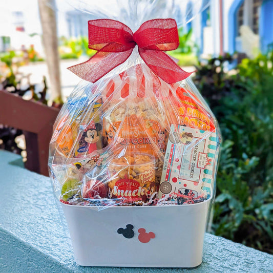 Disney Parks snack gift basket with red bow, perfect for Walt Disney World resort deliveries in Orlando
