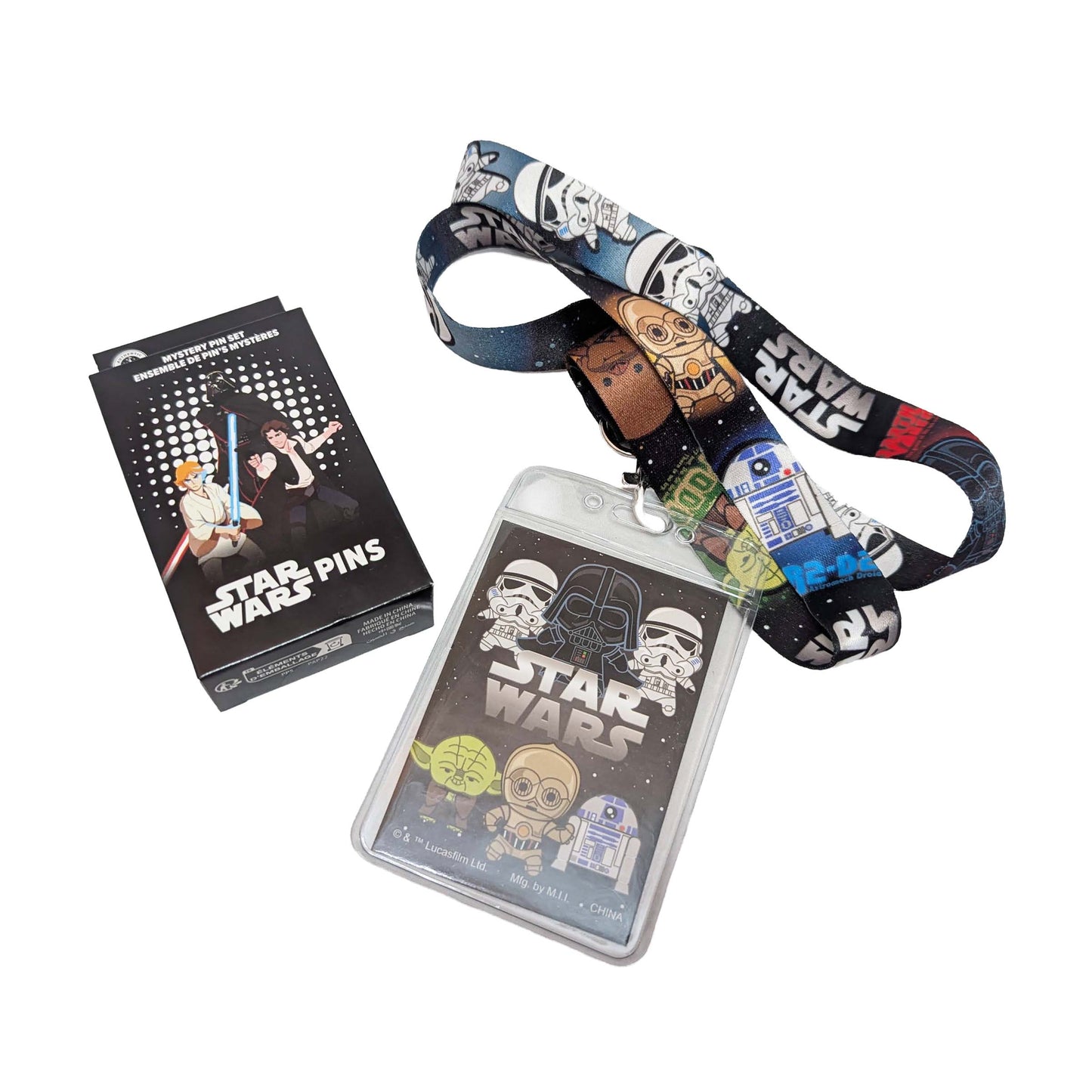 Disney Star Wars-themed lanyard, badge holder, and mystery pin box starter set for pin trading adventures at Walt Disney World area resorts.