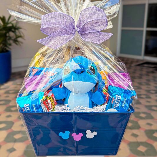 Custom Disney Stitch gift basket filled with an 8-inch licensed plush toy, Rice Krispies Treats, and sweet snacks for Orlando resort delivery