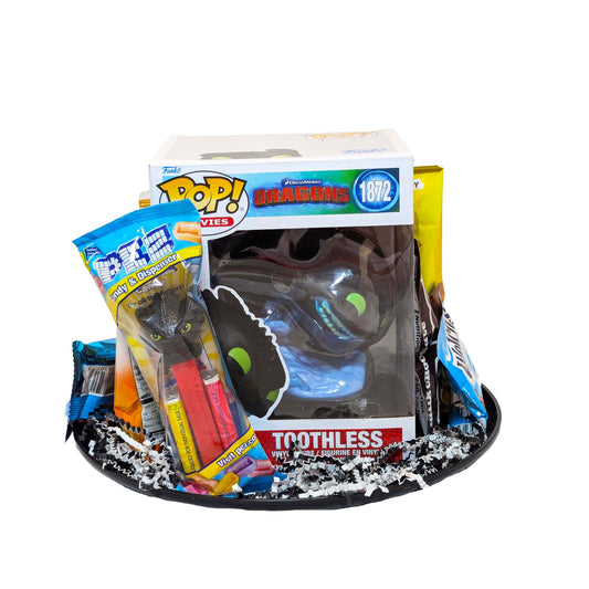 Funko Pop! Toothless Night Fury themed gift basket packed with assorted sweet and salty snacks and a collectible PEZ dispenser for theme park resort delivery