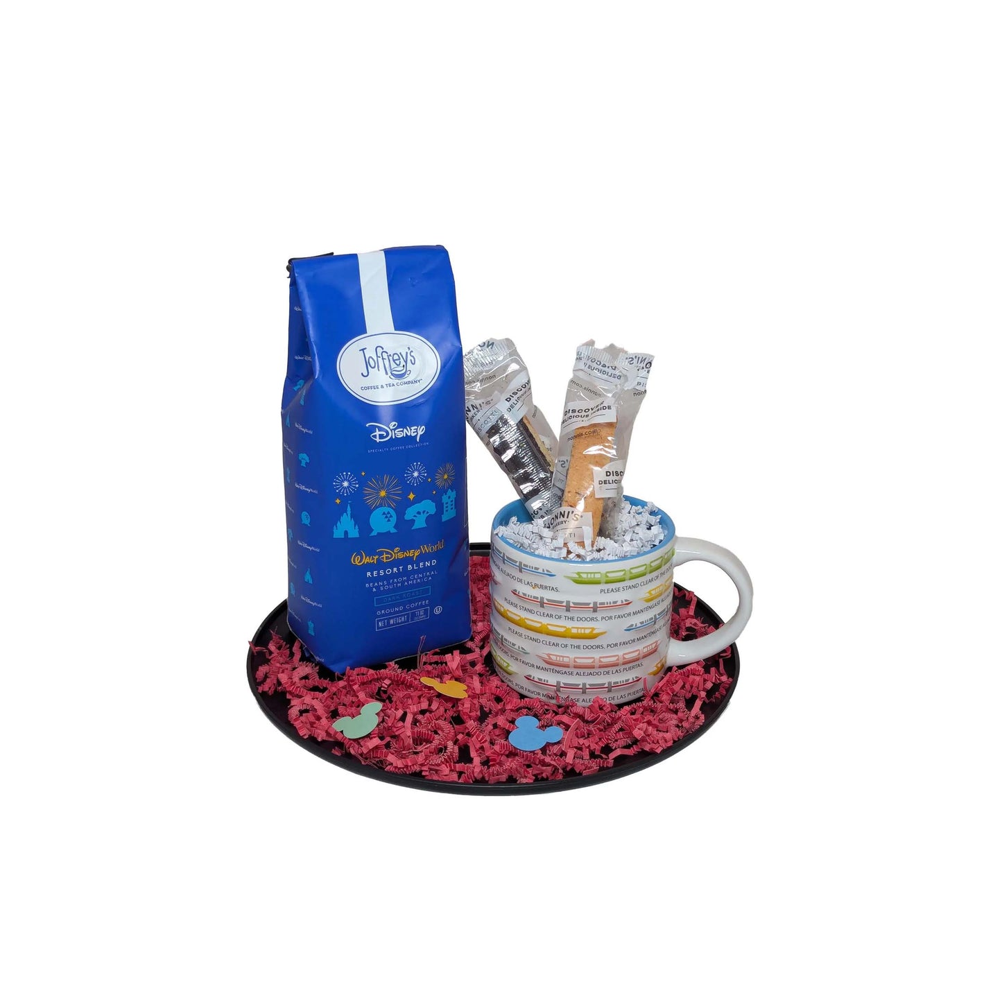 Happiest Sip on Earth gift basket featuring Joffrey’s Disney Resort Blend coffee, a white monorail-themed mug, and biscotti for Walt Disney World area resort delivery
