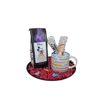 Happiest Sip on Earth gift basket featuring Joffrey’s Mickey Mouse Classic Blend coffee, a white monorail-themed mug, and biscotti for Walt Disney World area resort delivery