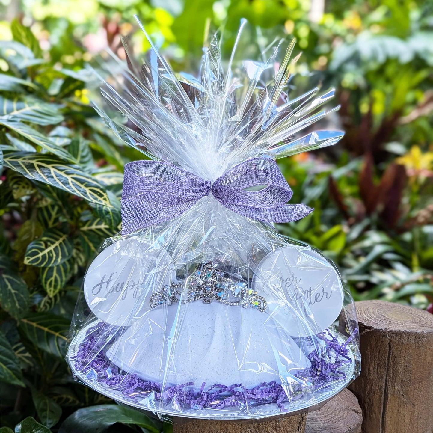 Disney wedding ear hats with "Happily Ever After" buttons in a custom gift basket, perfect for Walt Disney World resort deliveries in Orlando