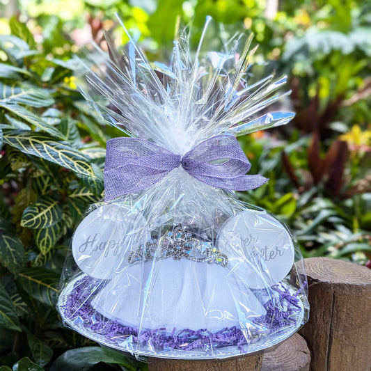 Disney wedding ear hats with "Happily Ever After" buttons in a custom gift basket, perfect for Walt Disney World resort deliveries in Orlando