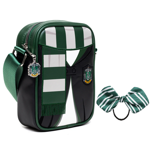 Green and black Slytherin house crossbody bag with an emblem and a matching striped hair tie bow for an Orlando resort gift basket