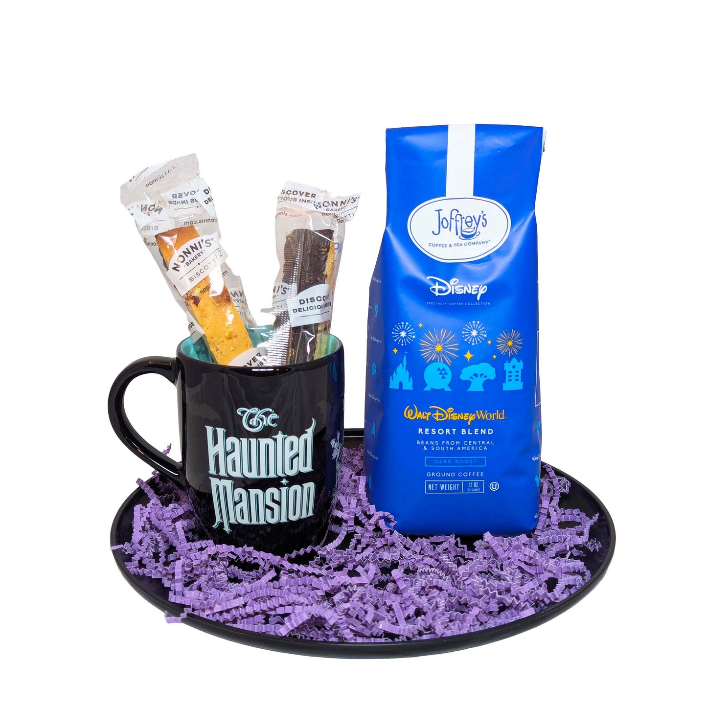 Haunted Mansion themed black coffee mug with biscotti and a blue bag of Joffrey's Resort Blend coffee for Disney vacation gifts