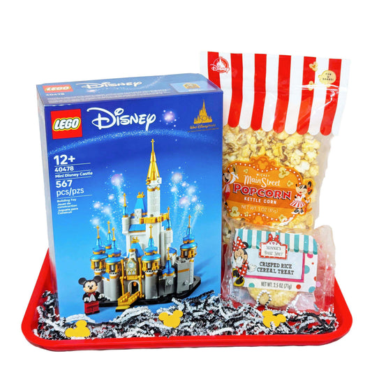LEGO Disney castle set with popcorn and candy on a red tray, included in custom gift baskets for Walt Disney World resort deliveries in Orlando