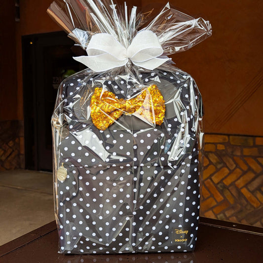 Disney Minnie Mouse Igloo 24-can backpack cooler wrapped as a gift, perfect for custom resort deliveries at Walt Disney World and Universal Orlando