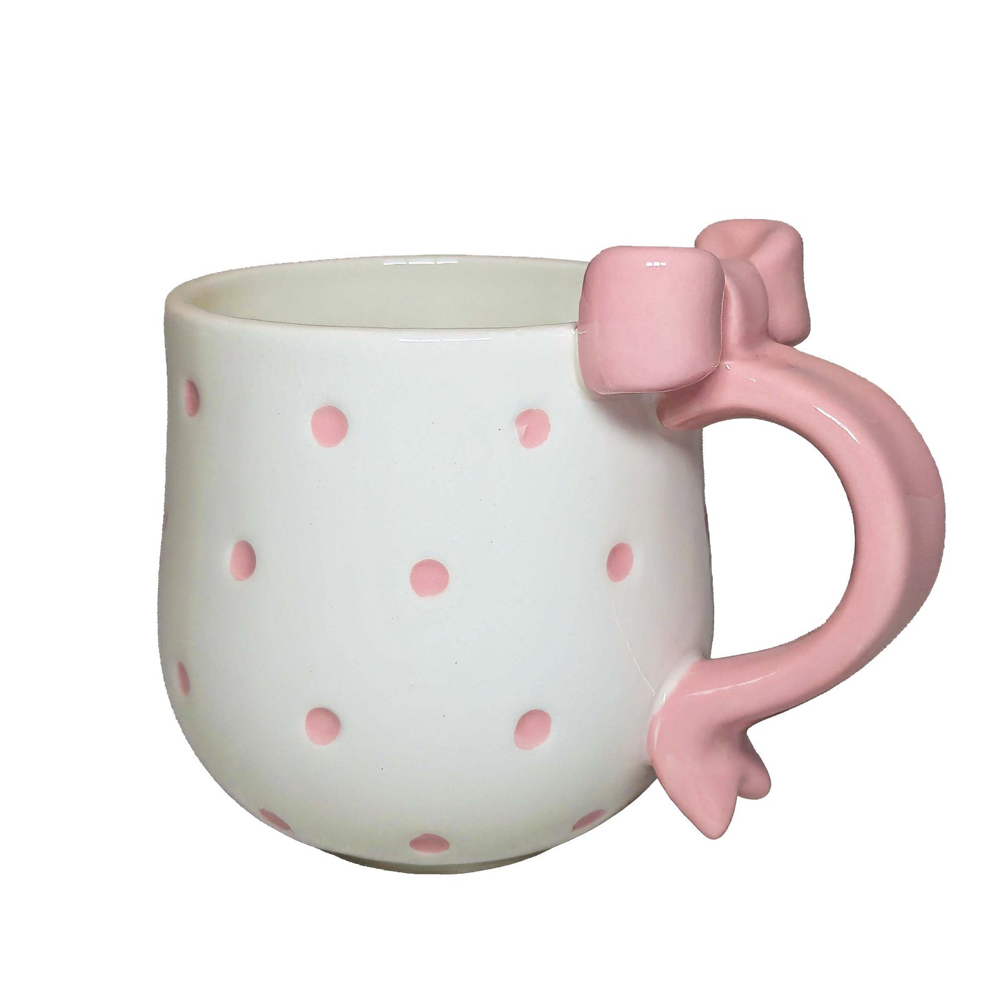 White ceramic mug with pink polka dots and a matching pink handle, perfect for themed Orlando resort gift baskets
